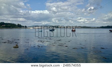 Some Fishing Boats Near A Toxa Island In O Grove Spain
