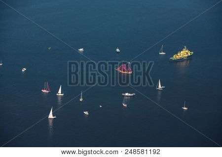 Sea Regatta. The Varma Icebreaker. A Lot Of Sailboats And Yachts In The Mouth Of The Daugava River.