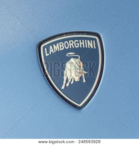 Close-up Lamborghini Logo On Grey Aventador