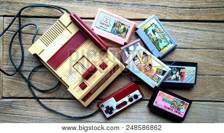 Bangkok, Thailand - March 31, 2017 : Old Nintendo Entertainment System Family Computer And Game Cart