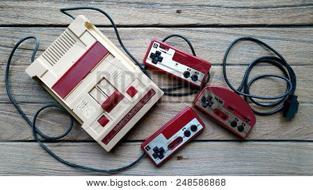 Bangkok, Thailand - March 31, 2017 : Old Nintendo Entertainment System Family Computer And Hori Cont
