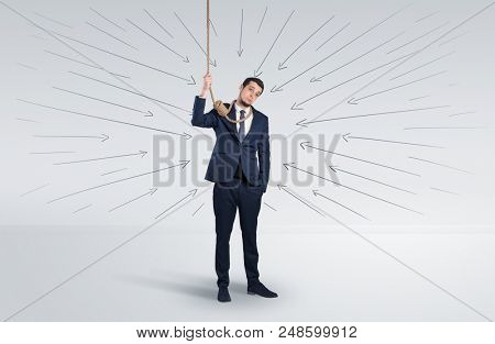 Hopeless young businessman trying to suicide with question signs concept