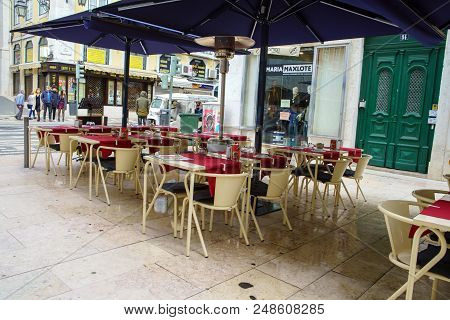Lisbon - April 01 , 2018 : Cafe Terrace In The Pedestria Area Of The Barrio Alto, Or Upper Town, In 