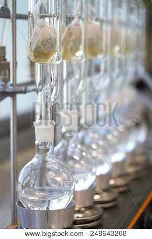 Soxhlet Extractor.percolator-boiler And Reflux,distillation Flask On Heating Element.organic Chemist