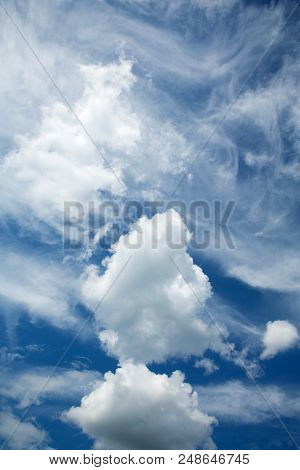 Blue Sky Background With White Clouds
