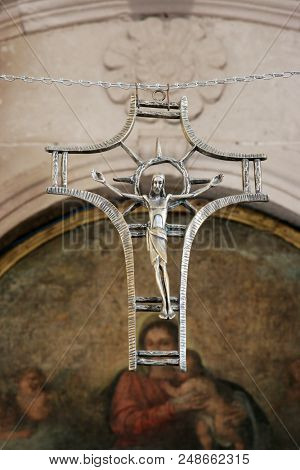 PUPNAT, CROATIA - MARCH 21: Cross in the Church of Our Lady of the Snows in Pupnat, Korcula island, Croatia, on March 21, 2017.