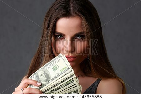 Beautiful European Woman Portrait. Scattering Money Notes Dollars In Fashion Vows Style  Curly Hair 