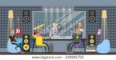 Sound Recording Studio. People Sitting In Control Room With Different Equipment For Capturing, Mixin