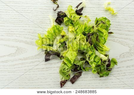 Fresh Green Lettuce Red Little Gem Variety Chopped Flatlay On Grey Wood