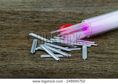 Close Up  Capillary Tube With Blood Lancet , Medical Equipment On Wooden  Background,selective Focus