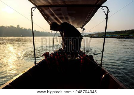 Silhouette Boat Driver In Sangkhla Buri Thailand,beautiful Songgaria River,thailand Destination