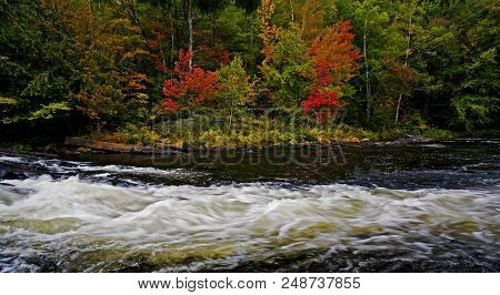 The Oxtongue Rapids Near Algonquin, Canada In Autumn