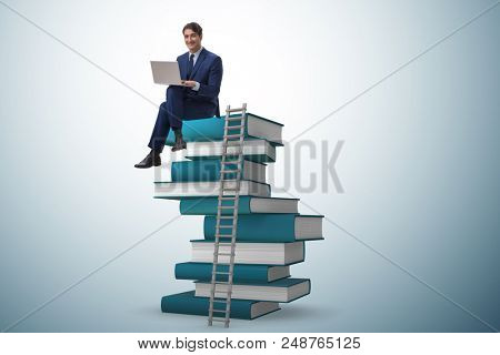 Businessman in telelearning concept with laptop