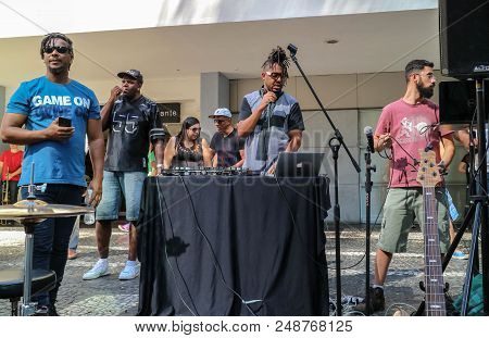 Sao Paulo, Brazil - July 8, 2018: An Unidentified Group Of People And A Dj At Paulista Avenue Playin