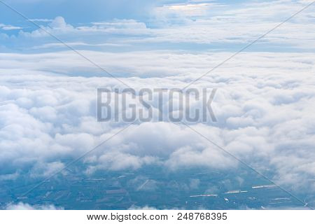 Big Blue Sky And Cloud And City Under Cloud Top View From Airplane Window,nature Background