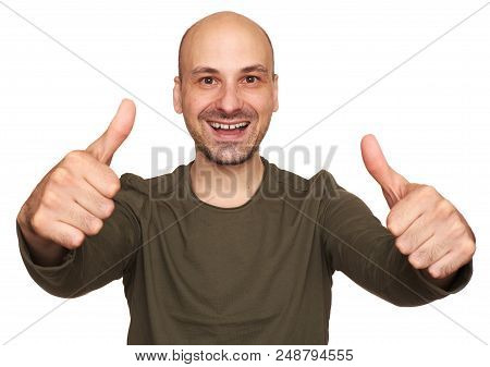 Happy Man Makes A Gesture Thumb Up. Isolated