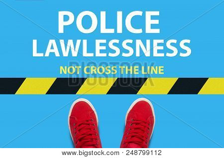 Legs In Red Sneakers On A Blue Background A Restrictive Yellow And Blak Stripe With Text Not Cross T