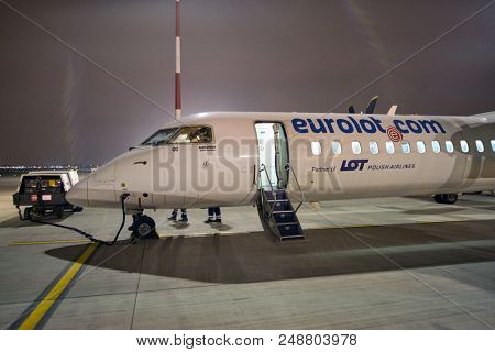WARSAW, POLAND - CIRCA NOVEMBER, 2017: Eurolot Bombardier Q400 NextGen at Warsaw Chopin Airport.