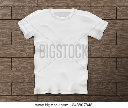 White Realistic Male T-shirt With Short Sleeves. Blank T-shirt Template On Vintage Wooden Floor Isol