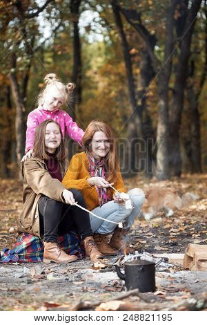 Happy Family - Smiling Mom And Daughter On Picnic In The Autumn Forest
