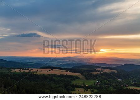 Summer Sunset Landscape With Green Forest And Beautiful Inspirational Table Mountains. Evening Sky W