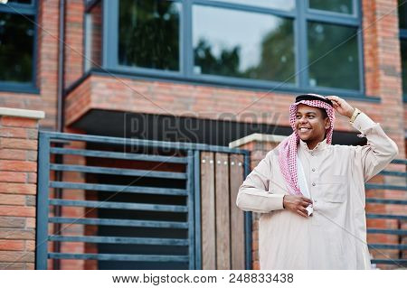 Middle Eastern Arab Man Posed On Street Against Modern Building.