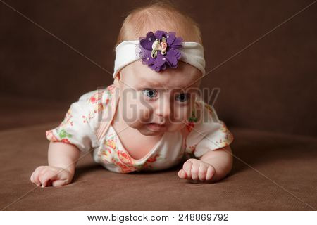 Beautiful Baby Girl Crawling And Rolling Over In Bed