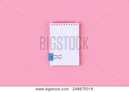 Top View Of Blank Notebook On Colorful Background Pink With Copy Space.