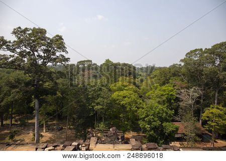 Landscape With Ancient Temple In Angkor Wat Complex, Cambodia. Jungle Forest View From Ta Keo Temple