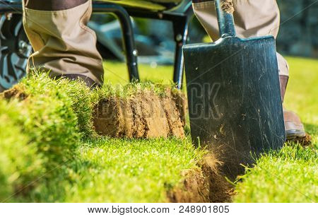 Digging Ditch For The Garden Water Supply. Irrigation System Building.