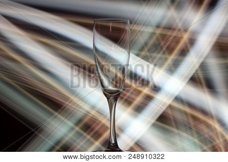 Night Photo Of Champagne Glass With Bright Lights