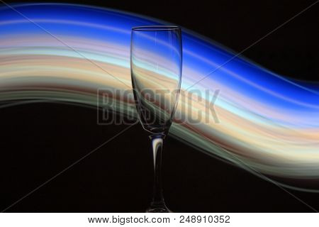 Night Photo Of Champagne Glass With Bright Lights