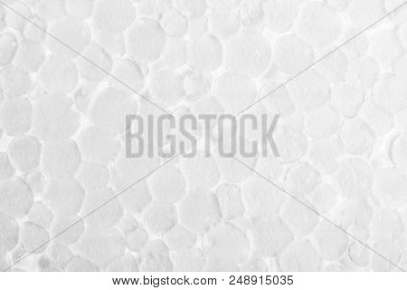 Foam Plastic Texture Pattern As A Background. White Foam Plastic Abstract Texture. Macro Shot