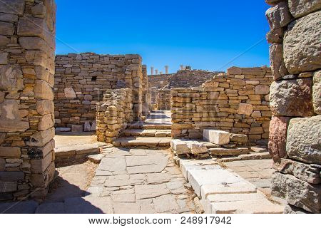 Ancient Ruins In The Island Of Delos In Cyclades, One Of The Most Important Mythological, Historical