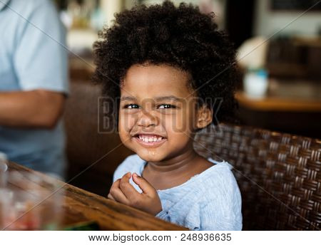 Cute little African boy at a resort