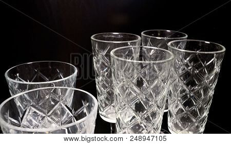 Kitchen Utensil, Collection Of Transparent Empty Vintage Crystal Glass Stemware Used To Set A Table 
