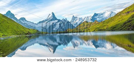 A Magical Panorama Landscape With A Lake In The Mountains In The Swiss Alps, Europe. Wetterhorn, Sch