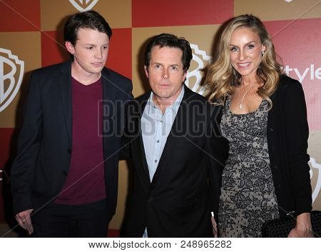 LOS ANGELES - JAN 13:  Michael J Fox, Tracy Pollan & son Sam arrives to the WB/In Style Golden Globe Party  on January 13, 2013 in Hollywood, CA                