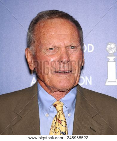 LOS ANGELES - AUG 13:  Tab Hunter arrives to the Hollywood Foreign Press Association Installation Luncheon  on August 13, 2013 in Hollywood, CA                