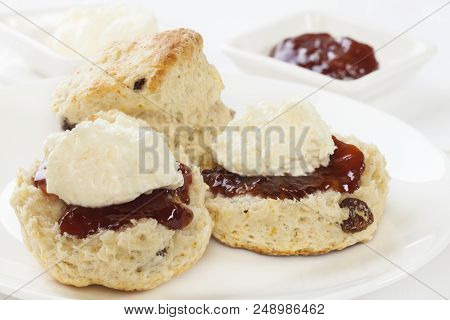 Fresh Homemade Fruit Scones With Jam And Cream.