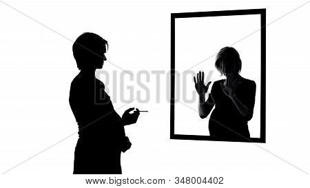 Conscience-stricken Pregnant Woman Smoking Cigarette In Front Of Mirror, Habits