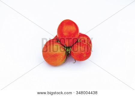Ugly Food, Vegetable. Deformed Organic Ripe Tomato On White Background. Buying Misshapen Produce As 
