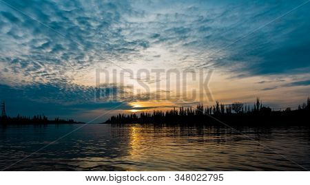 Sunset Over The Volga River Near The City Of Volgograd