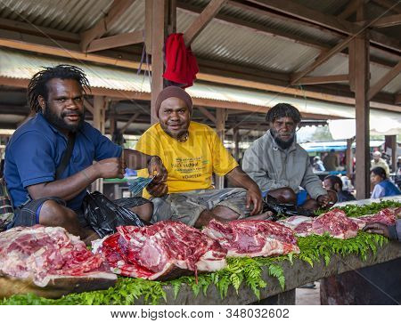 Indonesia, Papua New Guinea, Wamena, Irian Jaya, 21 August 2019: Papuans Mans Sell Large Pieces Of P