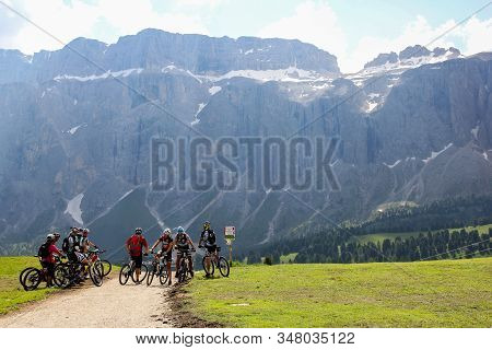 Dolomites, Italy, 20 July 2013 - A Group Of Moutanin Bikers Are On The High Mountain Road. Dolomites