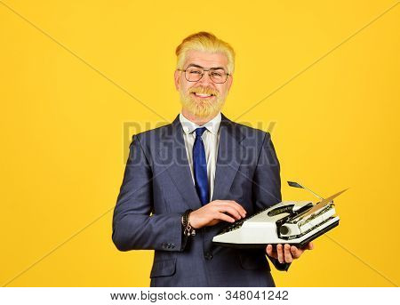 Mature Man Dyed Beard Hair. Professional Typist Make Notes. Modern And Old Technology. Digital Busin