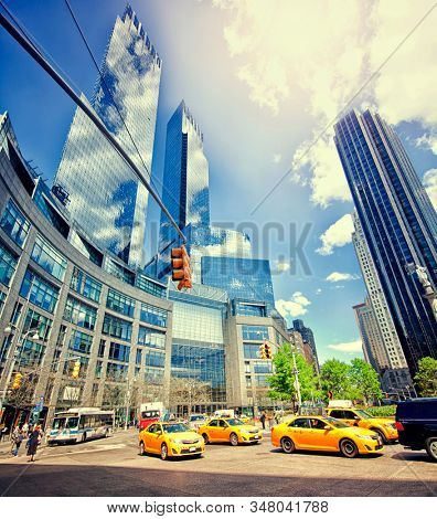  Columbus Circle, New York, USA: April 2015; Traffic in the famous Columbus Circle in New York City