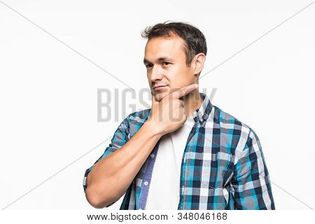 Thoughtful Man Holding Hand On Chin Pose Of Indecision, Look Aside At Copy Space Isolated On White G