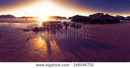 Scenery Rocks And Cliff In Nature In Noja Village,cantabria,spain.sunset Seascape And Beach In Coast