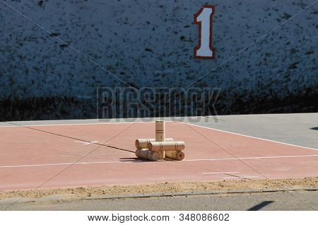 Gorodki - A Russian Folk Sports Game. In This Game You Need Specific Distances To Smash Figures Made